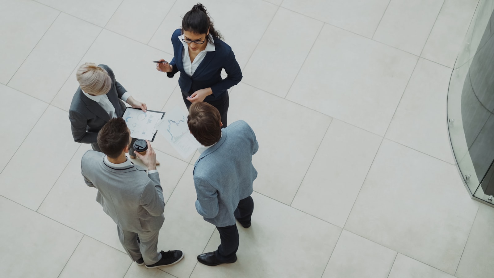 Professional team reviewing structured information in an analysis meeting
